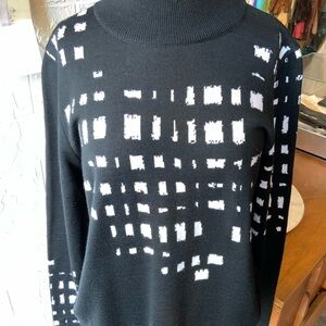 Black and white Trine Kryger Simonsen graphic wool blend sweater.